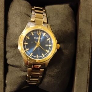 Bulova Gold Timepiece with Deep Blue Face